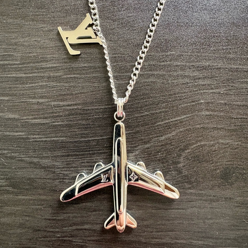 Louis Vuitton Silver Airplane Pendant with Chain